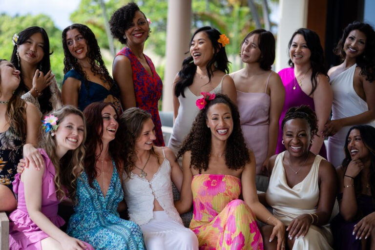 women entrepreneur retreat group sitting and smiling at each other