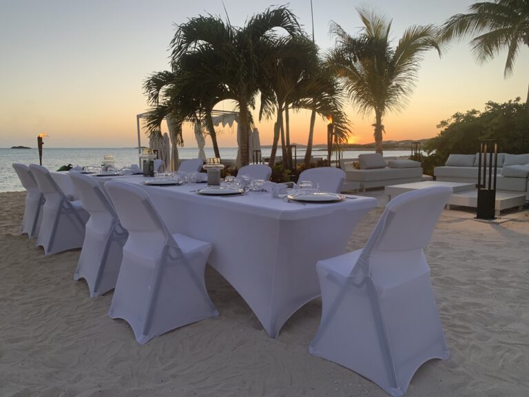 luxury sunset dinner on the beach during executive corporate retreat