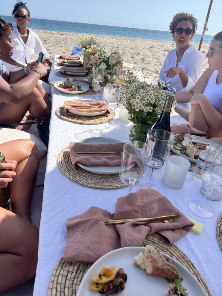 picnic on the beach during a high end corporate retreat