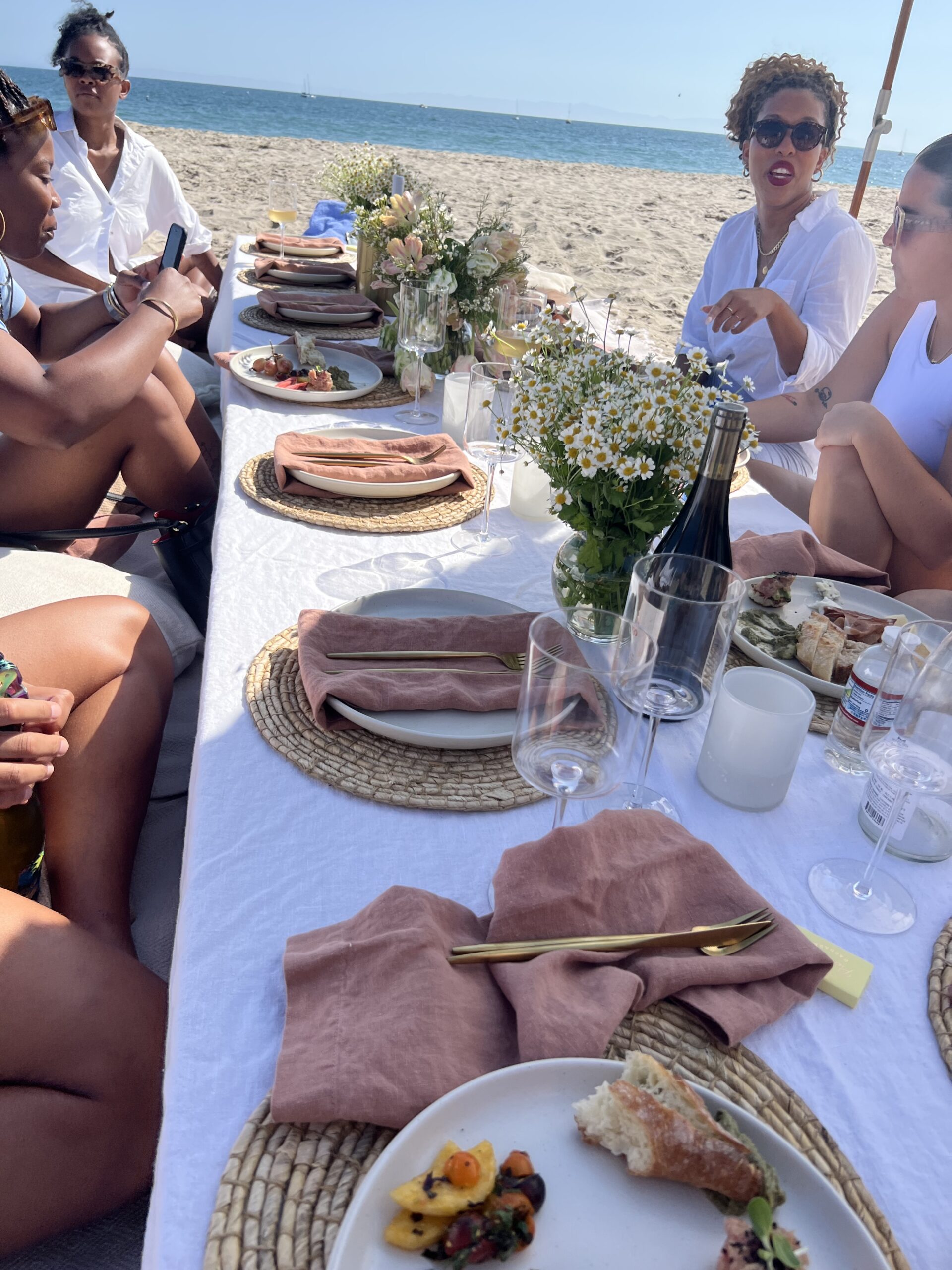 picnic on the beach during a high end corporate retreat