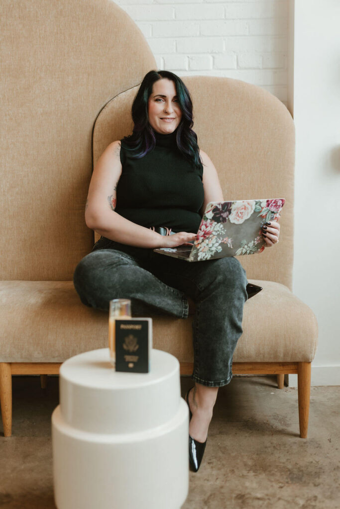event planner using her laptop to create a custom retreat itinerary